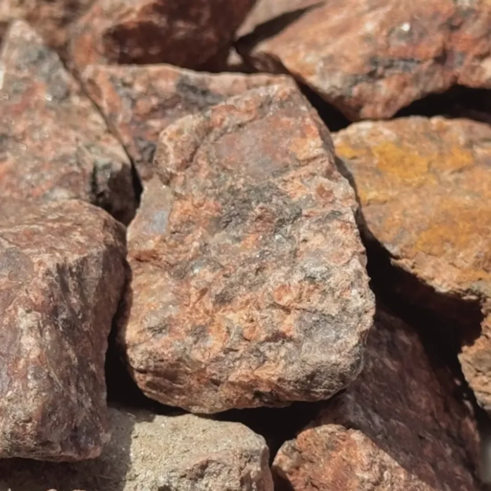 Ruby Red landscape rock sized from three-quarter to one-and-a-half inches